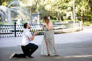 surprise proposal in forsyth park engagement photographer in savannah