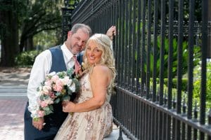 Savannah wedding photos in front of wrought iron at forsyth park t photographer in savannah