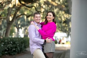 hot pink shirt and black and white skirt engagement session at forstyh park 