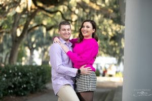 hot pink shirt and black and white skirt engagement session at forstyh park