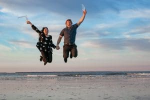 jump in the air engagement photos on tybee