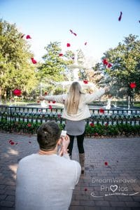 Rhett and Jordan - surprise proposal with rose petals at Forsyth Park