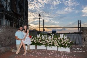 surprise proposal with flowers and marry me letters JW marriott 