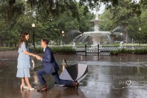 surprise proposal in the rain at forysth park savannah ga