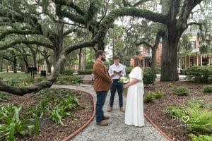 small wedding elopement at forsyth Park photographer tall trees spanish moss live oak